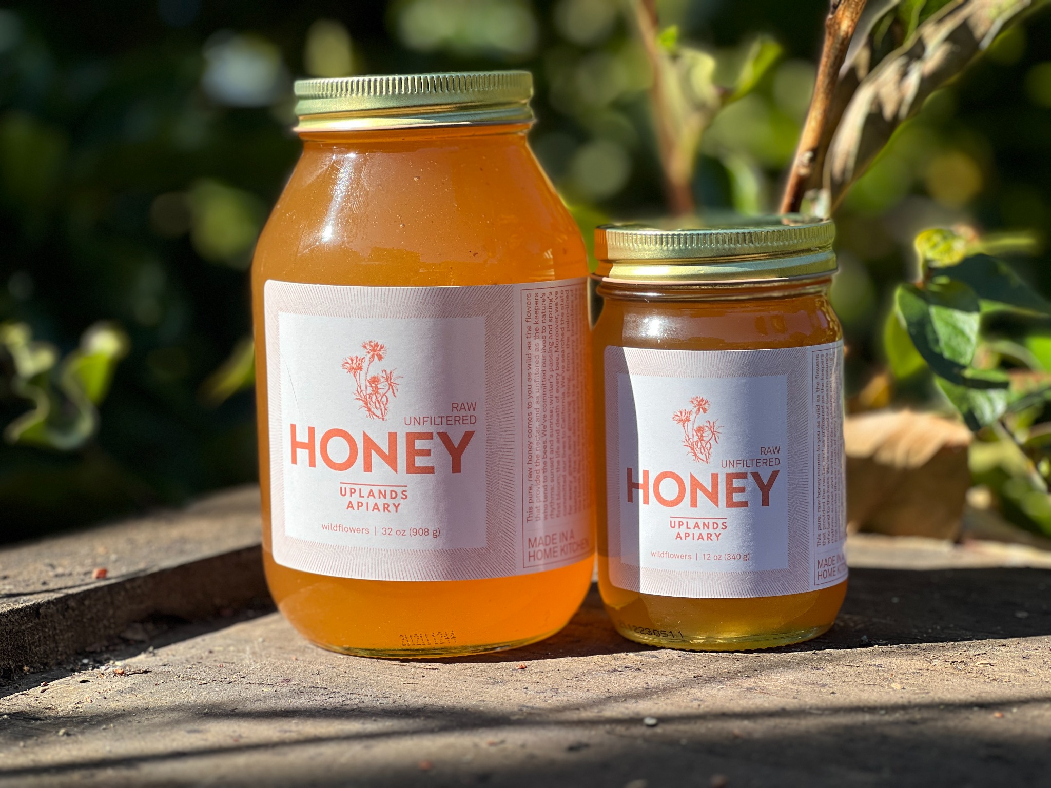 Jars of raw unfiltered California honey from The Honey Trust